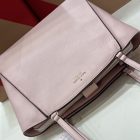 Kate Spade Brim Laptop Tote 

COLOR:
Chalk Pink - Picture 8 of 16